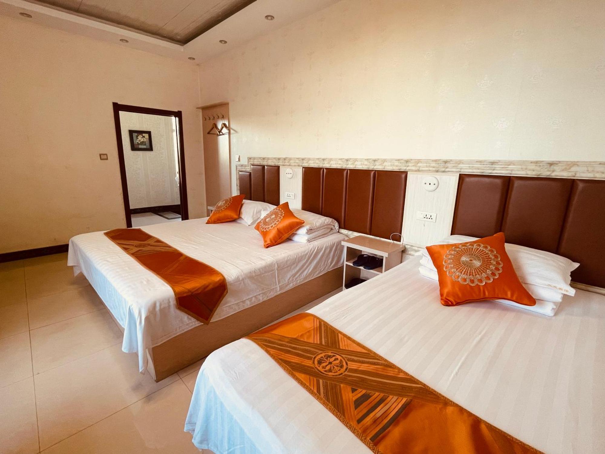 哈尔滨机场东方红运宾馆 Hotell Rum bild