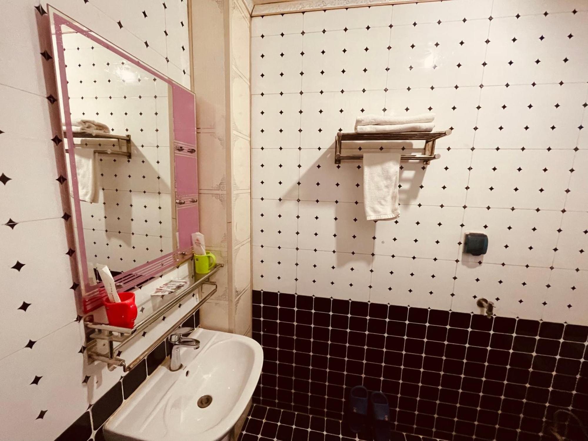 哈尔滨机场东方红运宾馆 Hotell Rum bild