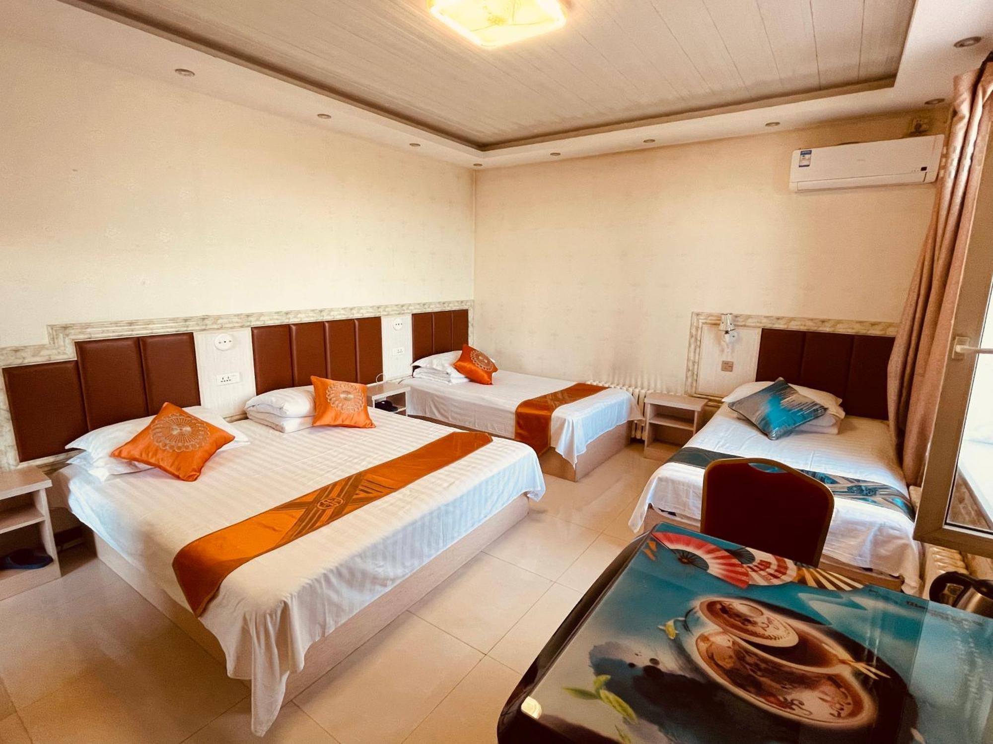 哈尔滨机场东方红运宾馆 Hotell Rum bild