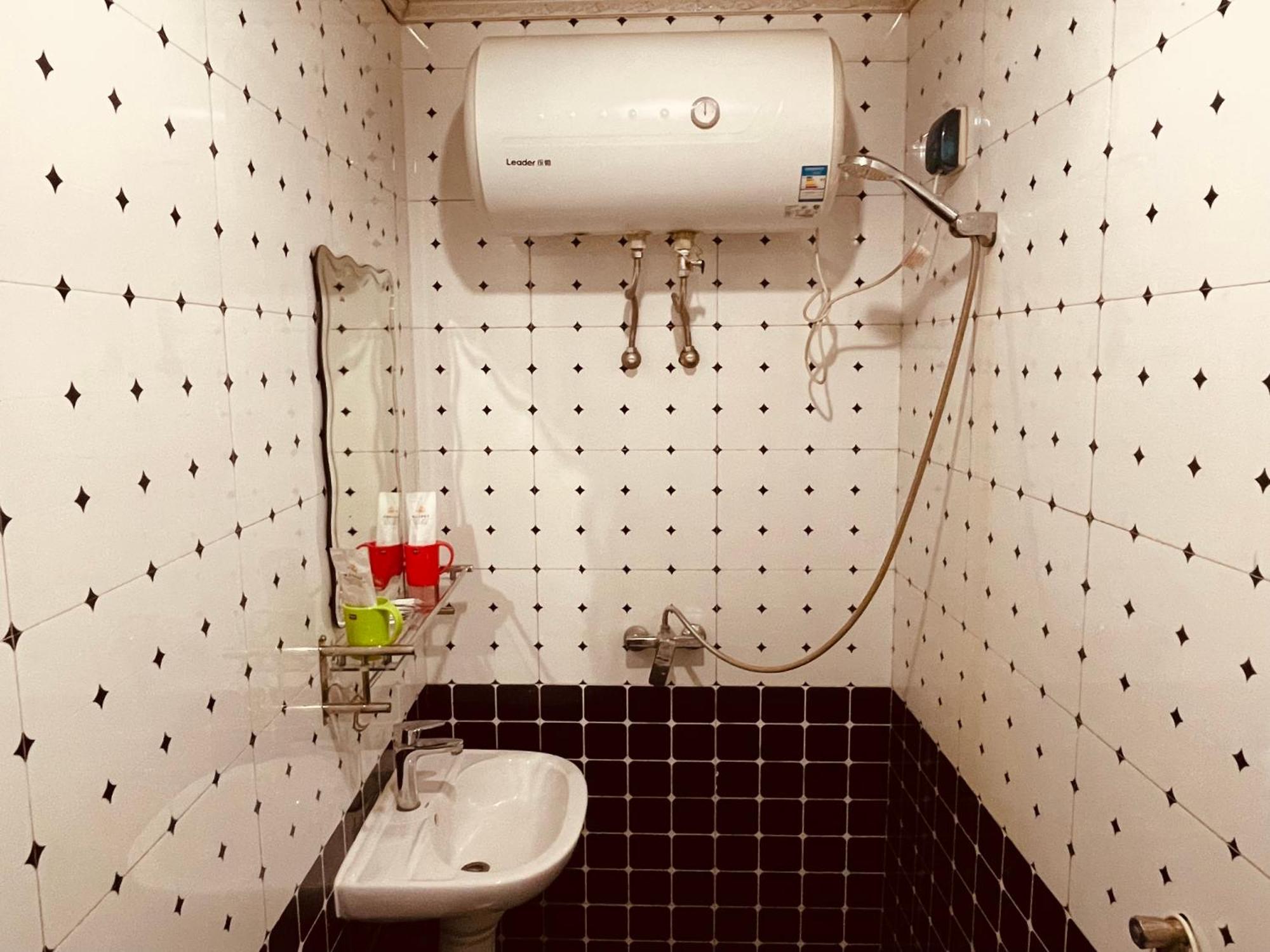 哈尔滨机场东方红运宾馆 Hotell Rum bild