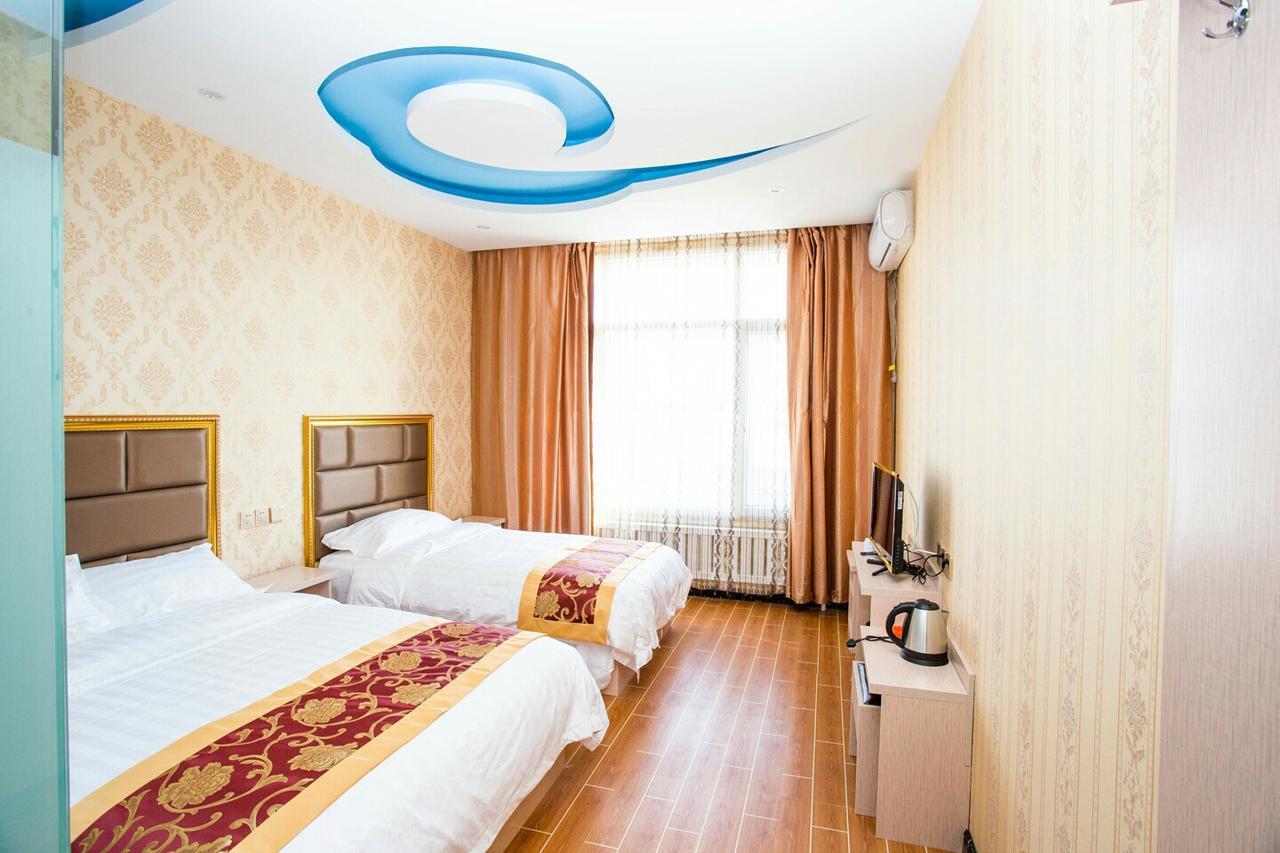 哈尔滨机场东方红运宾馆 Hotell Exteriör bild