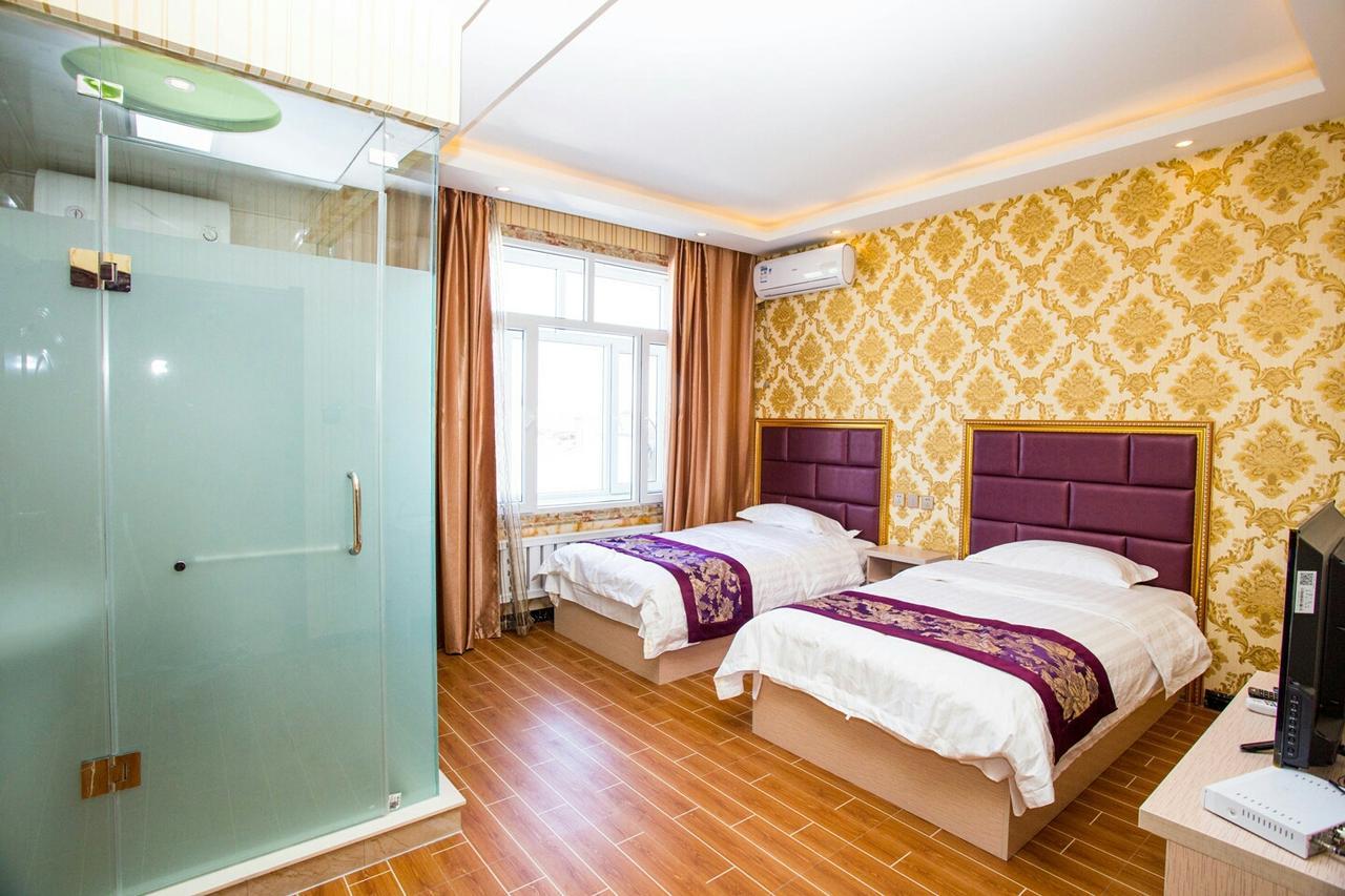 哈尔滨机场东方红运宾馆 Hotell Exteriör bild