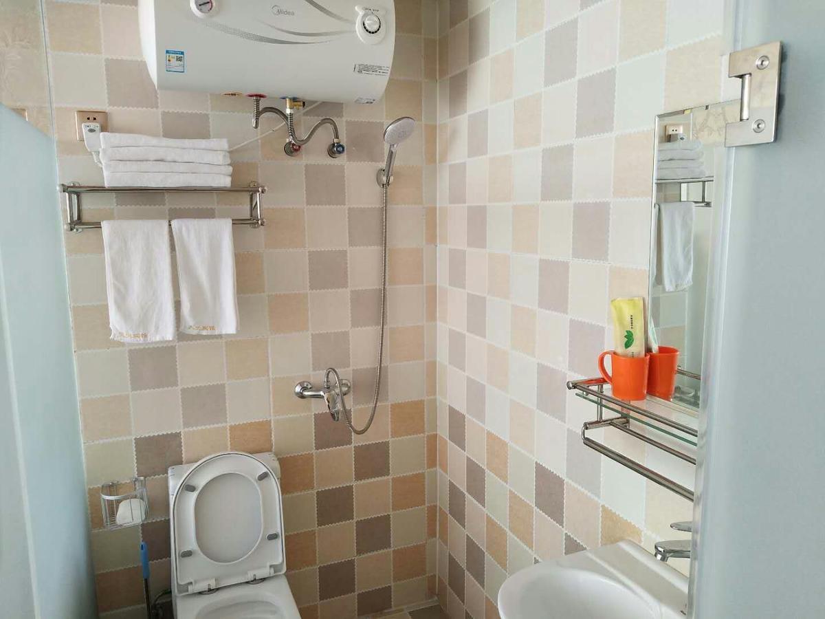 哈尔滨机场东方红运宾馆 Hotell Exteriör bild