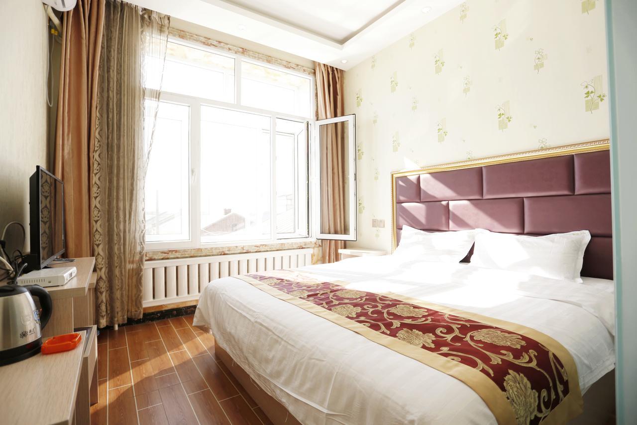 哈尔滨机场东方红运宾馆 Hotell Exteriör bild