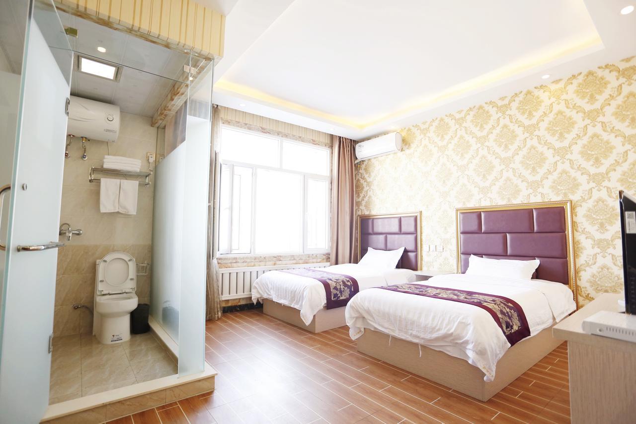 哈尔滨机场东方红运宾馆 Hotell Exteriör bild